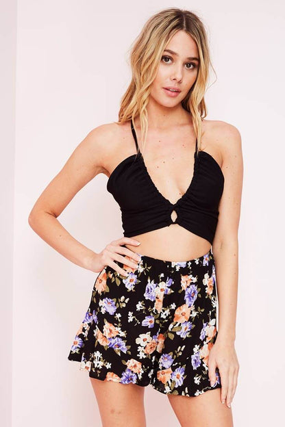 Black and Floral Romper with V-Neck and Keyhole Cutout